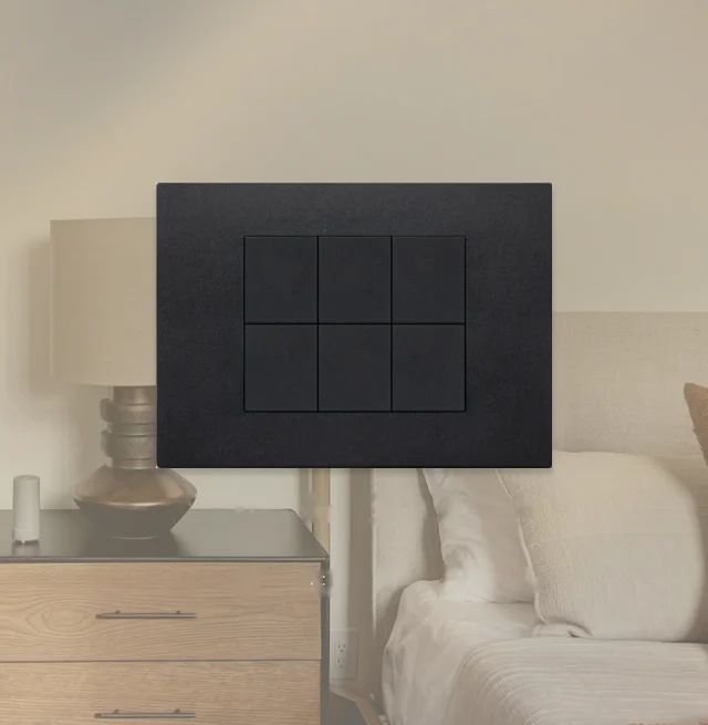 A designer keypad on a bedroom wall