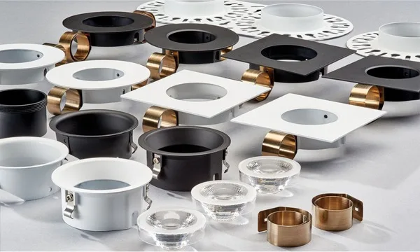 Ceiling downlight parts in black, white and bronze